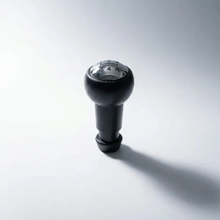 Pommeau de vitesse Berlingo noir, vue latérale sur fond blanc