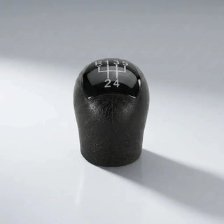 Pommeau de vitesse noir Clio 1, vue produit isolée avec schéma des vitesses gravé