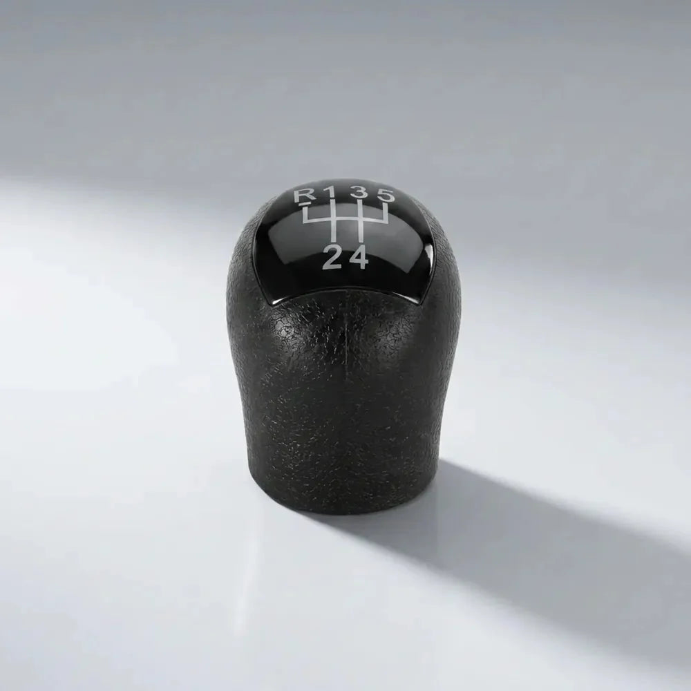Pommeau de vitesse noir Clio 2, vue produit isolée avec schéma des vitesses gravé